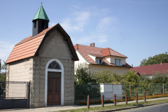 Zvonička v obci Bělušice